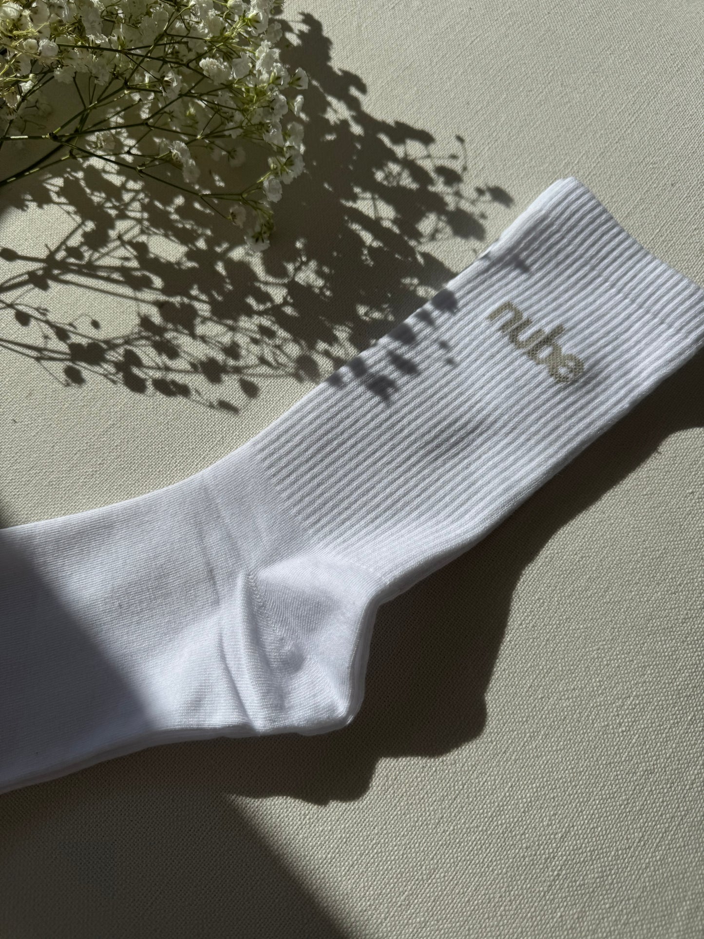 Vita tub sockar